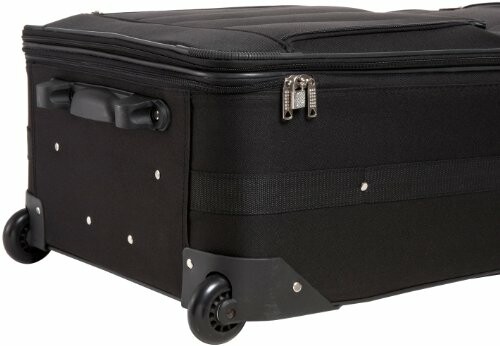 Black rolling suitcase with wheels and handle