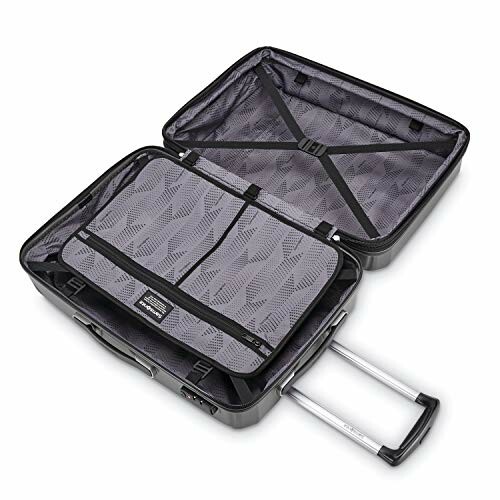 Open black suitcase with wheels and extendable handle